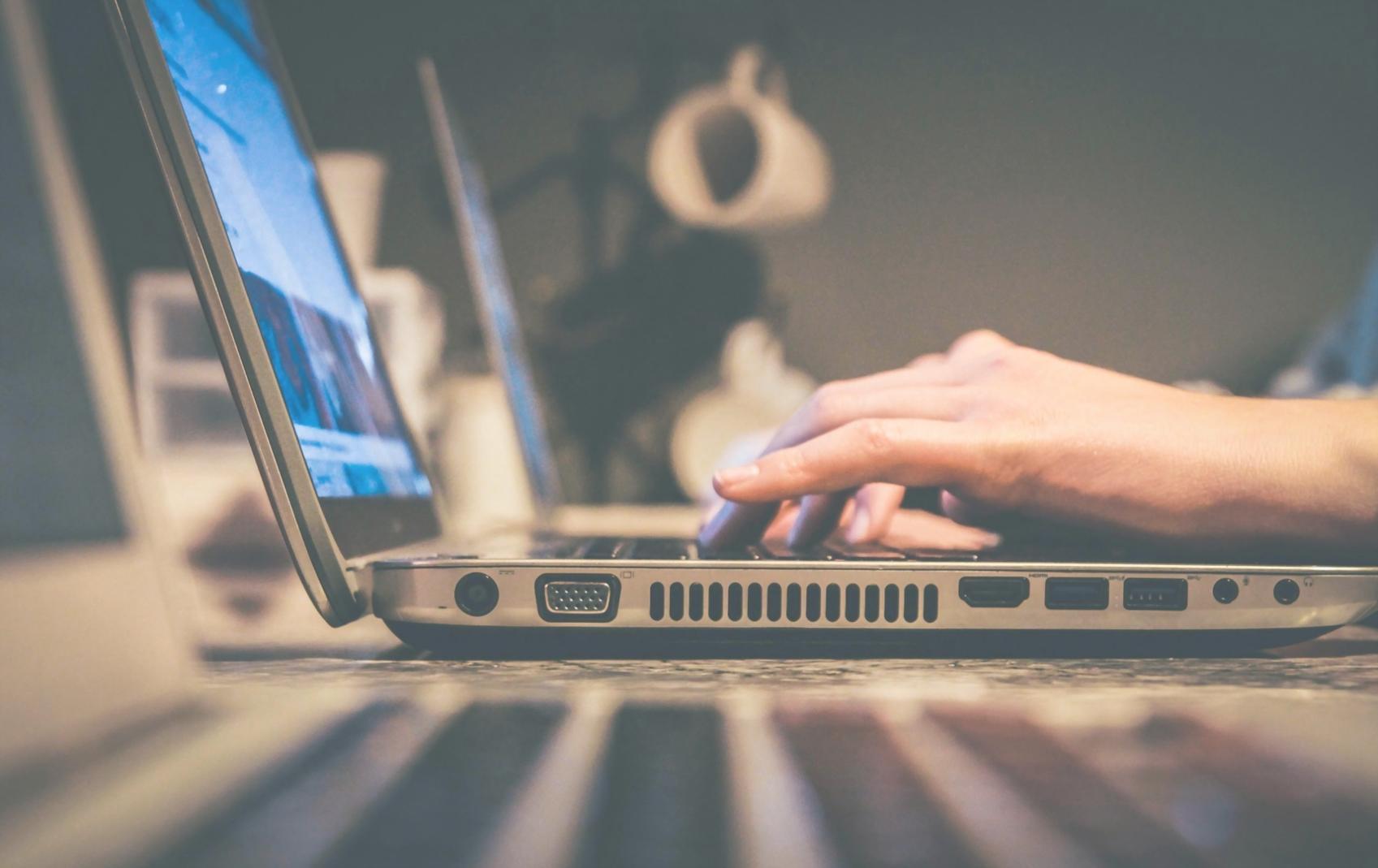 Close-up view of smart contract code on computer screen with debugging tools and testing frameworks visible