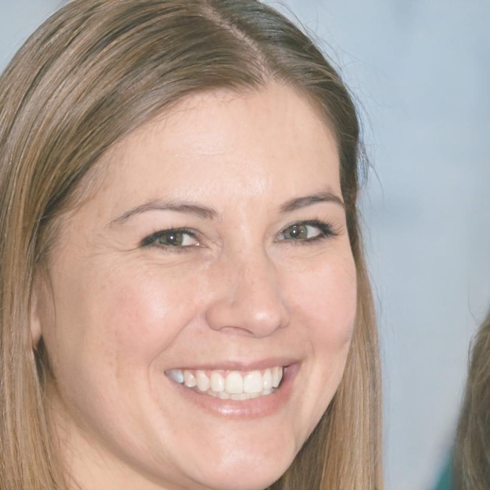 Professional headshot of blockchain education expert and industry consultant