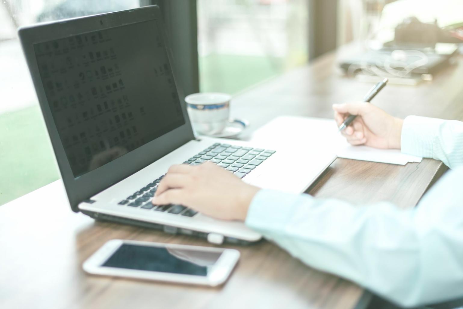 Advanced blockchain development workspace with multiple monitors displaying smart contract code and cryptocurrency analytics